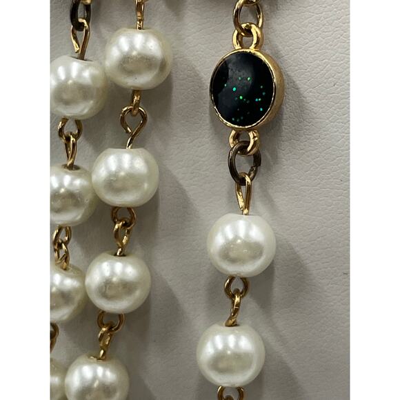 Tory Burch Authentic Long
Pearl Logo Medallion
Multi-Strand Gold 60" Necklace - Picture 12 of 15